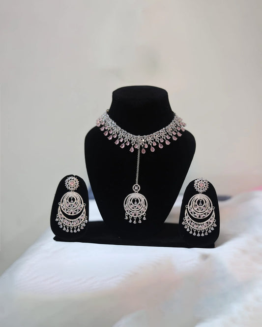 CZ & AD Studded necklace set with earrings and Maangtikka.💫